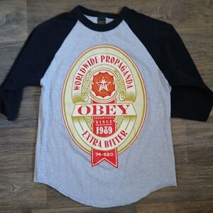 OBEY Worldwide Propaganda Extra Bitter 3/4 Sleeve Graphic T-Shirt.